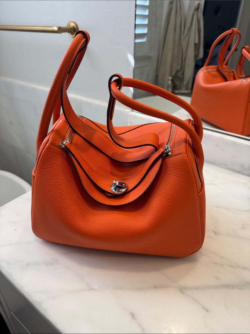 Textured Orange Leather Shoulder Bag with Turn-Lock Flap